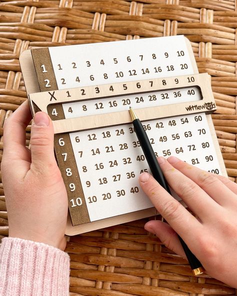 "The wooden multiplication chart is the ideal educational teaching material for preschool, primary school, kindergarten and more. Its portable size provides convenience in outdoor, classroom and home use. Quality and Safe Material: Multiplication table was made by natural wood, eco-friendly, as well as light weight and durable. High-quality plywood, the surface is smooth without burr, which will not hurt children's hands. Cleaning the product should be done with a damp cloth without using abrasi Montosory Activities, Multiplication Times Tables, Homeschool Supplies, Multiplication Chart, Montessori Educational Toys, Multiplication Table, Laser Cut Wood Crafts, School Kindergarten, Laser Engraved Ideas