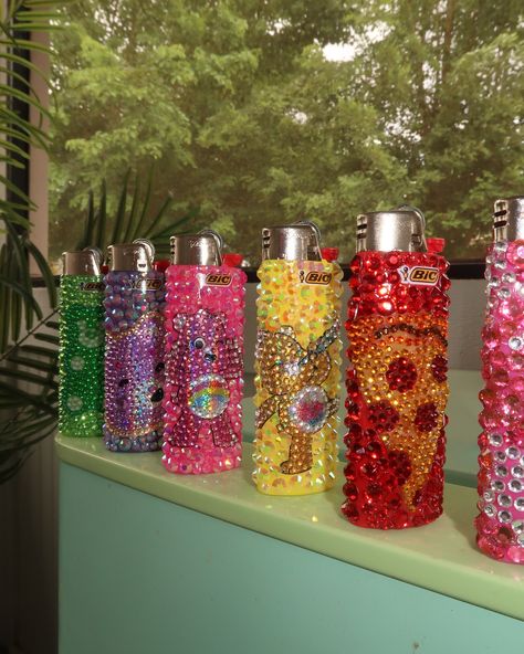 Bedazzle lighters DROP IS LIVE NOW!!! ⭐️⭐️⭐️ there is only 1 of each design available… website in bio Bedazzled Lighter, Rhinestone Cups, Rhinestone Projects, Rhinestone Art, Live Now, Live In The Now, Only 1, Bling Bling, Light Up