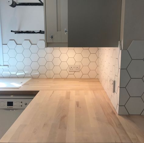 White hexagon tiles for kitchen splashback Hexagon Tile Splashback, Hexagonal Tile Kitchen, Hexagon Kitchen Tiles, White Hexagon Tile Kitchen, Hexagon Tiles Kitchen, Back Splashback Kitchen, Back Splashback Kitchen Ideas, Hexagon Backsplash Kitchen, Splashback Kitchen Ideas