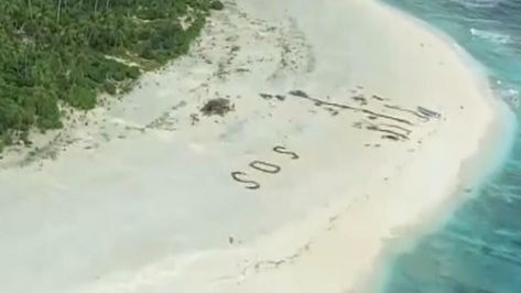 'SOS' message in sand saves three men stranded on deserted Pacific island | World News | Sky News Stranded Island Aesthetic, Desert Island Aesthetic, Stuck On A Deserted Island Aesthetic, Castaway Aesthetic, Stranded On An Island Aesthetic, Deserted Island Aesthetic, Stranded On Island, Stranded Island, Stranded On An Island