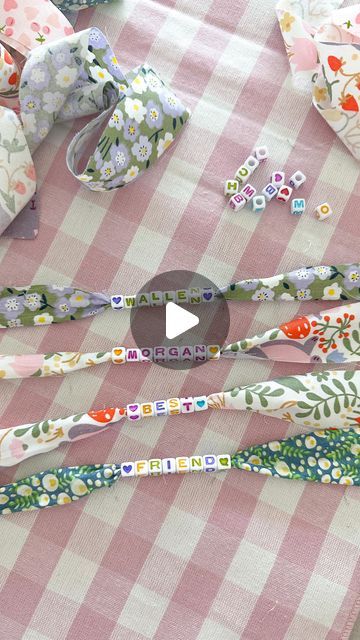 Aurelie Erikson on Instagram: "DIY fabric bracelets, aka concert bracelets 🎀   It’s officially concert season, so grab your girlfriends because girls' night just got a whole lot more fun! Everyone will LOVE making these bracelets! 🌼🌸  Tip *cut fabric strips in half down the center   everything I used is 🔗 in my Amazon store front in bio!  save & share with a friend 🫶🏼 . . . . . . . #summercrafts #diybracelet #friendshipgoals #craftylife #craftygirl #girlsnight #summercrafts #diycrafts #tutorial #morganwallen #concertseason" Fabric Friendship Bracelets Diy, Fabric And Bead Bracelets, Fabric Beaded Bracelets, Fabric Scrap Bracelet, Diy Fabric Bracelets Tutorials, Diy Fabric Bracelets, Fabric Friendship Bracelets, Craft Night Ideas Ladies, Bracelet Making Party