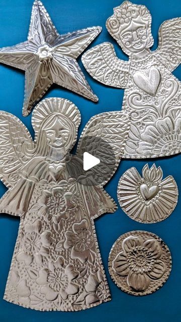 Regina Lord - Creative Kismet on Instagram: "Angels, stars, hearts and flowers. All hand embossed using 36g aluminum, a dull pencil, pencil smudger and scissors. So fun. (Not for sale). . . . . . #metalembossing #christmasdecorations #holidayornaments #handmadechristmas #holidaydecor #artbyReginaLord" Metal Embossed Art, Aluminum Foil Embossing, Metal Christmas Ornaments Diy, Diy Metal Ornaments, Embossed Metal Art, Embossed Ornaments, Tin Foil Crafts, Embossing Foil, Embossing Art