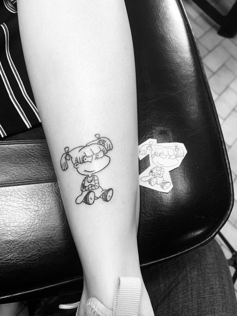 #angelica #rugrats #tattoo #tattooideas #minimalisttattoos #blackline #tattooinspiration #cartoontattoos Angelica Tattoo Rugrats, Rugrats Tattoo Ideas, Angelica Tattoo, Rugrats Tattoo, Angelica Rugrats, Food Tattoos, Tatoo Inspiration, Finger Tattoo For Women, Movie Tattoos