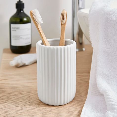 * Crafted from 100% ceramic * Great for holding your toothbrush and toothpaste * Matching accessories available * Durable and stylish If you're looking for a way to keep your toothbrush, toothpaste and floss from getting lost in the clutter then this is the product for you. This stylish holder is crafted from durable 100% ceramic and will match perfectly with any decor. Toothbrush And Toothpaste, Christmas Furniture, Beginner Pottery, Cerámica Ideas, Flat Interior, Toothbrush Toothpaste, New Ceramics, Bath Storage, Matching Accessories