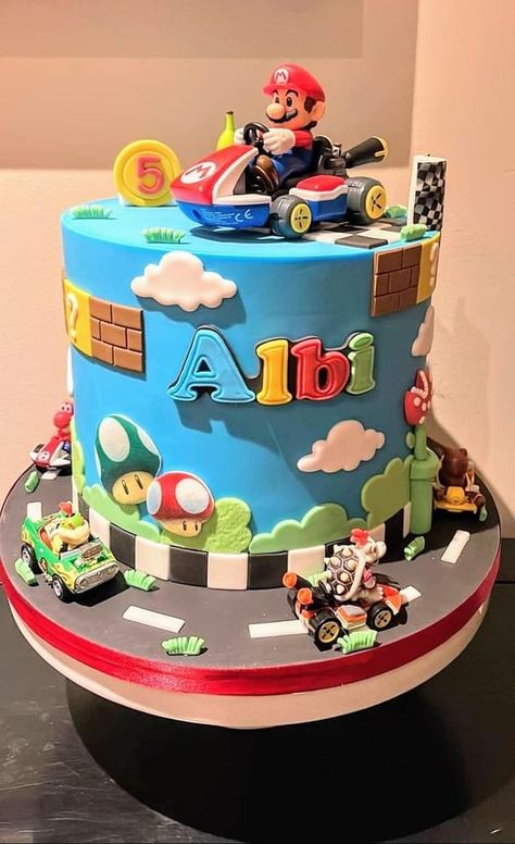 Blue Mario Kart Cake with track Mario Birthday Cake 5, Super Mario Race Track Cake, Birthday Cake Mario Bros, Mario Kart Birthday Party Cake, Mario Cart Cakes, Mario Kart Theme Party, Mario Kart Cake Ideas, Mario Cart Cakes Birthday, Luigi Birthday Cake