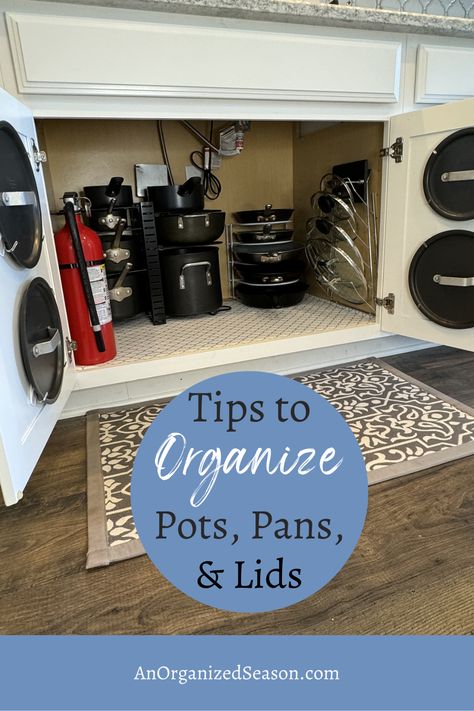 Tired of digging through your kitchen cabinets to find the right pot or pan? We've got you covered with our easy and practical tips to organize pots, pans, and lids 🍳 Discover space-saving solutions and stylish storage ideas for your cookware! 💖 Please pin this and follow us for more home organization inspiration! 😉 Under Sink Pots And Pans Storage, How To Store Pot Lids Kitchen Organization, Organizing Lids For Pots And Pans, Pot Top Organizer Lid Storage, Lid Holder For Pots And Pans, Organize Pots And Pans, Pots Snd Pan Storage, Pan Storage Diy, Pot Lid Storage