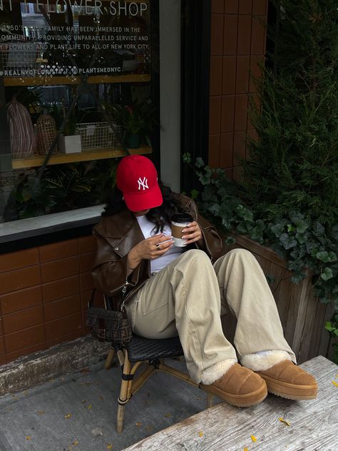 Red yankee hat, fall outfit, pop of red, styling uggs, ugg slippers, red hat outfit, brown and red outfit, ugg outfit Nyc Yankees Hat Outfit, Nyc Yankees Hat, Ny Beanie Outfit, Nyc Baseball Cap Outfit, Nyc Hat Aesthetic, New Yankees Cap Outfit, Brown Yankees Hat Outfit, Red New York Yankees Hat Outfit, 9forty Cap Outfit