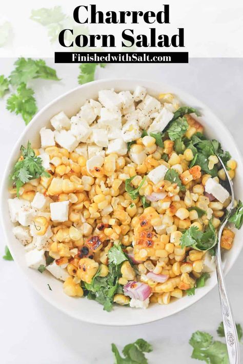 This Charred Raw Corn Salad recipe transforms the summer meets fall fresh corn bounty into a wonderfully easy healthy side dish, perfect for any BBQ or picnic! Made with feta cheese and fresh herbs, you are sure to love it if you are a fan of Mexican corn salads! #finishedwithsalt #corn #salad #sidedish #healthy #summer #bbq #harvest | finishedwithsalt.com Corn Feta Salad, Raw Corn Salad, Easy Healthy Side Dishes, Chicken Quinoa Salad, Corn Salad Recipe, Best Macaroni Salad, Corn Salad Recipes, Healthy Side Dish, Mexican Corn