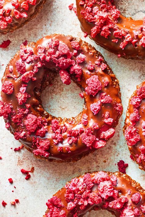 This chocolate French cruller recipe incorporates dried raspberries to create the ultimate chocolate recipe meets dessert recipe.#chocolaterecipes #dessertrecipes #donuts #donutrecipes #chocolatedesserts Cruller Recipe, French Cruller Recipe, Crullers Recipe, French Cruller, Cruller Donuts, Choux Dough, French Crullers, Raspberry Chocolate, Freeze Dried Raspberries