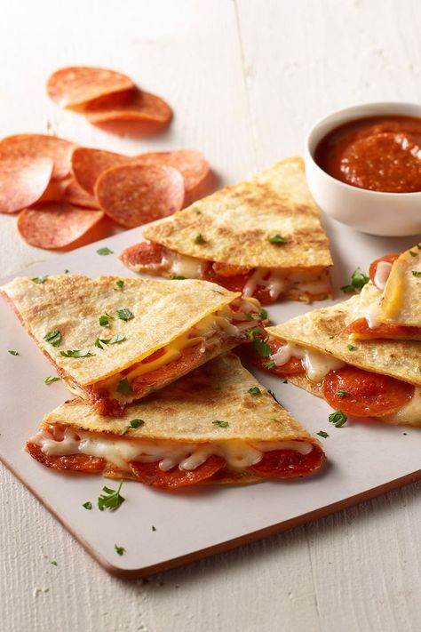 The Pepperoni Quesadilla recipe with HORMEL® Pepperoni is family-friendly, quick to make and gives you oven-baked pizza taste in a fraction of the time! Leftover Pepperoni Recipes, Diced Pepperoni Recipes, Recipes Using Pepperoni Slices, Snacks With Pepperoni, Tortilla Pizza Oven, Pepperoni Quesadilla, Cheese And Pepperoni Crisps, Pepperoni Pizza Quesadillas, Tortilla Pepperoni Pizza