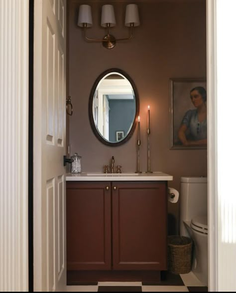 Red Half Bathroom Ideas, Burgundy Cabinets Bathroom, Painted Cabinet Bathroom, Burgundy Bathroom Vanity, Mauve Half Bath, Dark Cabinet Bathroom Ideas, Moody Mauve Bathroom, Oxblood Bathroom, Mauve Pink Bathroom