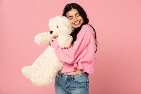 smiling young woman hugging teddy bear, Isolated On pink Hugging Stuffed Animal Pose Reference, Hugging Teddy Bear Pose Reference, Hugging Plushie Pose, Hugging Teddy Bear, Active Poses, Aesthetic Portrait, Big Teddy Bear, Small Teddy Bears, Portrait References