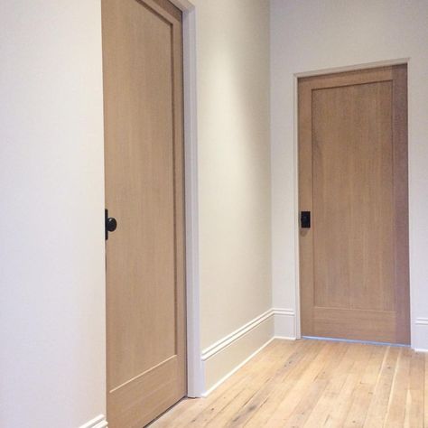 Blonde floors, white oak doors, black hardware Interior Door Black Hardware, Interior Door Styles Modern Wood, Kaemingk Design, Interior Door Black, Fir Doors, Blonde Flooring, Interior Doors White, Interior Doors Modern, Indian Road