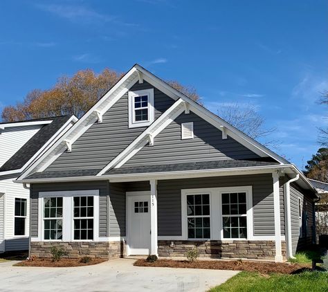 Stonecrest (gray) Vinyl Siding with white trim Vinyl Siding Color Schemes, Grey Siding House, Exterior Vinyl Siding Colors, Outdoor House Colors, Grey Vinyl Siding, Vinyl Siding House, Vinyl Exterior Siding, Vinyl Siding Colors, Outside House Colors