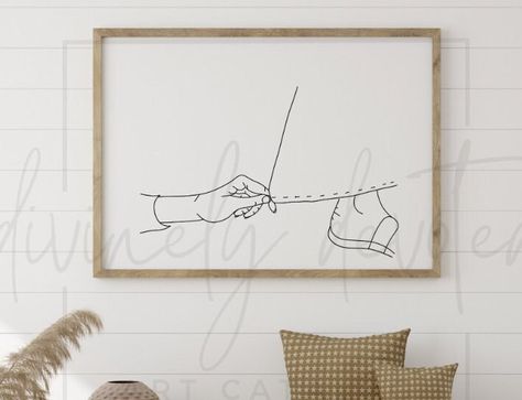 "Close Enough to Touch is a stunning piece of Christian wall art that features a beautiful depiction of faith in the healing power of Jesus Christ. The minimalist design of this artwork makes it a perfect addition to any modern home décor. Whether you are looking for a way to display your faith in a subtle but powerful way or simply want to add some beautiful artwork to your walls, this piece is sure to impress. The image of Jesus Christ in Close Enough to Touch is a reminder of the healing power of faith. The accompanying text reads \"Healed\" and serves as a reminder of the many times throughout the Bible when Jesus healed the sick and the brokenhearted. This piece is a beautiful representation of the hope and comfort that can be found through faith in Jesus Christ. The line art style of Bible Line Art, Christian Abstract Art, Subtle Christian Art, Jesus Line Art, Simple Christian Art, Christian Line Art, Modern Christian Art, Religious Artwork, Jesus Artwork