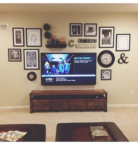 Gallery wall behind tv Picture Wall Behind Tv, Frames Behind Tv, Picture Wall With Tv Living Room, Picture Wall Ideas Above Tv, Pictures Above Tv Ideas, Picture Wall Ideas Around Tv, Photo Wall Above Tv, Hanging Pictures Around Tv, Frames Above Tv