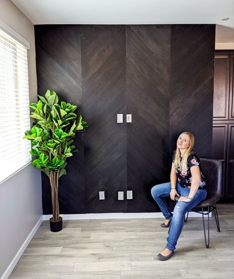 Black wood plank chevron living room accent wall with Minwax true black stain Modern Plank Wall, Chevron Accent Wall Bedroom, Stained Wood Accent Wall Bedroom, Wood Chevron Wall, Stained Wood Accent Wall, Black Herringbone Wall, Black Wood Accent Wall, Wood Plank Accent Wall, Wood Paneling Walls