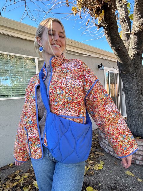 Feeling blue today!💙😄 loving this pairing or oranges with blues as I pair the Chloe quilt jacket with the Streetlevel bag! The perfect Bag and coat combo! Floral pops of color complement the pop of coloer quilted bag. Free People Nordstrom Follow my shop @Liv_a_Little on the @shop.LTK app to shop this post and get my exclusive app-only content! #ootd #style #streetstyle #LTKitbag @shop.ltk https://liketk.it/4sjVK #liketkit #LTKGiftGuide #LTKfindsunder50 #LTKitbag @shop.ltk https://liketk.it/4sjVK Chloe Jacket Free People, Pop Of Orange Outfit, Quilted Floral Jacket, Floral Quilted Jacket, Free People Quilted Jacket Outfit, Quilted Bag Outfit, Quilt Jacket Outfit, Orange Jacket Outfit, Floral Jacket Outfit