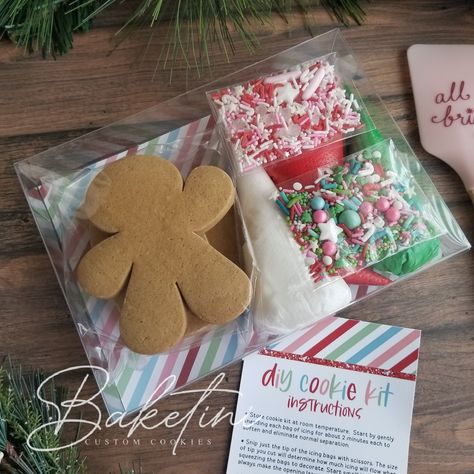 "Decorate Your Own! This adorable gingerbread cookie kit is easy to decorate, entertaining for all ages...and DELICIOUS!  A holiday must have.  Each 3\"-4\" cutout cookie is rolled to 3/8\" thickness and baked with the freshest ingredients these delicious GINGERBREAD FLAVOR cookies are sure to sweeten any day. BOXED KIT Includes TWO (2) baked to order cookies individually packaged and sealed in certified food safe clear bags. Cookie kit is  beautifully boxed for gifting in a crystal clear box with coordinating backer and neatly tied with loop bow and tag. Kits are then expertly wrapped and packed for secure shipping.  INCLUDES (1) Cute Gingerbread Man Cookie (1) Cute Gingerbread House Cookie (3) Icing Colors (2) Assorted Sprinkles (1) Instruction Card (1) Box with backer and lopp bow with Christmas Snack Activity For Kids, Natal, Cookie Package Ideas, Christmas Cookie Baking Party Ideas, Kids Christmas Cookie Decorating, Christmas Cookie Birthday Party, Christmas Cookie Kits For Kids, Halloween Diy Cookie Kits, How To Pack Cookies For Shipping