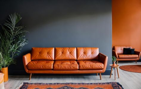 Living room have orange leather sofa and... | Premium Photo #Freepik #photo #sofa #sofa-chair #couch #sofa-set Orange Leather Couch, Orange Leather Sofa, Orange Leather Sofas, Photo Living Room, Dark Brown Walls, Orange Couch, Orange Chair, Chair Couch, Brown Wall