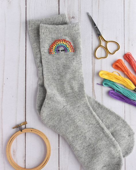 Do you know what you should do this weekend? Embroider rainbows on your socks! 🌈🧦 You can find my pattern and instructions for these in the latest issue of @simplysewingmag (issue 118). Let me tell you…they absolutely make me smile! As an added bonus, you can use your favorite rainbow of embroidery floss to truly make them your own! #embroidery #embroideredclothing #handstitched #instastitch #modernembroidery #kawaiicute #simplysewingmag #stitchupcycle Embrodery Socks, Embroider Socks Diy, Embroidery On Socks, Sock Embroidery, Socks Embroidery, Sock Ideas, Embroidery Socks, Embroidered Sweaters, Rainbow Embroidery