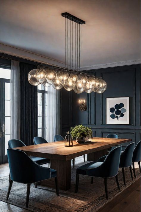 Modern, minimalist dining room with sleek pendant lighting Luxury Dining Room Lighting, Dining Area Decor Ideas, Modern Dining Room Luxury, Modern House Dining Room, Dinner Room Ideas, Conversation Room Ideas, Moody Dining Room Ideas, Dining Room Table Light Fixture, Beautiful Bungalows