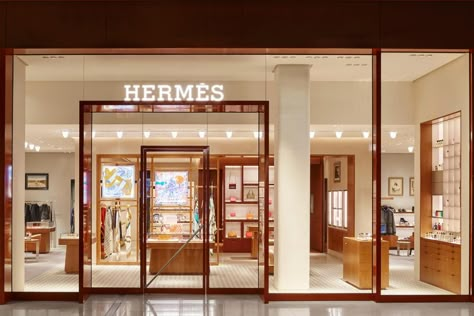 Hermès has a new store at Chadstone in Melbourne - Vogue Australia Hermes Interior Design, Hermes Interior, Luxury Boutique Interior, Window Backdrop, Hermes Store, Hermes Shop, Retail Store Interior Design, Luxury Furniture Stores, Open Sign