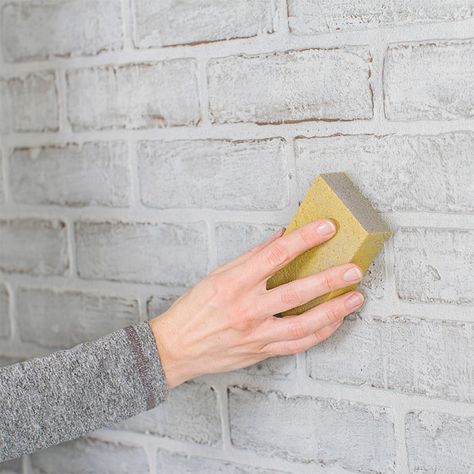 Sand the painted surface for a distressed finish. Painted Faux Brick Wall, Painting Ideas For Walls, Painted Brick Wall, Faux Brick Wall Panels, Ideas For Walls, Brick Ideas, Faux Brick Wall, Faux Brick Panels, Interior Brick