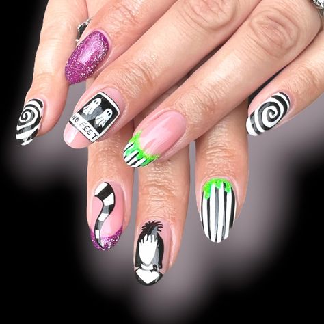 Bring the Madness of Beetlejuice to Your Fingertips with These Themed Press-On Nails! Inspired by the iconic film Beetlejuice, these press-on nails feature bold black and white stripes, ghostly figures, swirling patterns, and splashes of neon green. With a perfect mix of whimsy and spooky, these nails capture the essence of everyone's favourite "bio-exorcist." Whether you're attending a Halloween party or just want to channel your inner trickster, these nails are sure to make a statement. Why Yo Short Beetlejuice Nails, Tim Burton Nails, Beetlejuice Nail Art, Beetlejuice Nails, Ongles Design, Nails Inspired, Short Almond, Nail Art Tutorial, Swirl Pattern