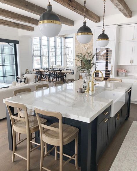 H O M E // Waking up to this beaut of a kitchen is an absolute dream!🥰 I legit, still pinch myself!🙋🏻‍♀️ I receive SO many questions about… Farm Sink Island, Cabinets.com Kitchens, Mullen Design Co, Homey Kitchen Modern, White Kitchen With Big Island, Large Dome Pendant Lights Over Kitchen Island, Kitchens With Blue Islands And White Cabinets, Timeless Farmhouse Style, Wide Island Kitchen