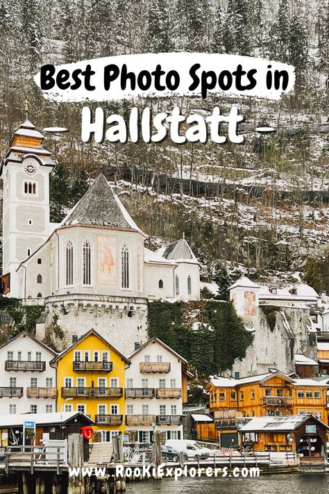 A serene view of Hallstatt from a ferry on the water. The mountainous terrain rises majestically in the background while the quaint, colorful buildings of the town line the shore. The text overlay reads "Best photo spots in Hallstatt. RooKiExplorers | Hallstatt | Winter | Mountain | Alps | Snow | Swans | Photospots | Instagram #Tips #Travel #Austria Hallstatt Austria Photo Ideas, Salzburg Austria Photography, Things To Do In Hallstatt Austria, Salzburg Photo Ideas, Hallstatt Photo Ideas, Hallstatt Austria Winter, Innsbruck Austria Winter, Hallstatt Christmas, Prague Instagram Photos