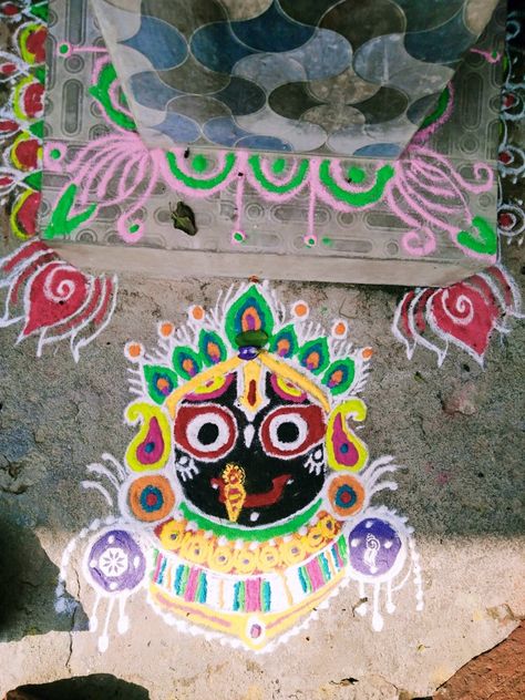 Panchuka means the last five days of holy Kartik month in Odisha. It begins on Ekadashi day during the Shukla Paksha of Kartik month & ends on Kartik Purnima. This month is dedicated to lord Jagannath & lord Jagannath is worshipped. Goddess Vrundabati in the form of sacred tulsi plant is worshipped by women. They also decorate the plant with beautiful muruja( rangoli) Jagannath Muruja Rangoli, Rangoli For Kartik Purnima, Panchuka Rangoli, Kartik Purnima Rangoli, Muruja Rangoli, Jagannath Rangoli, Jagannath Lord, Kartik Month, Kartik Purnima