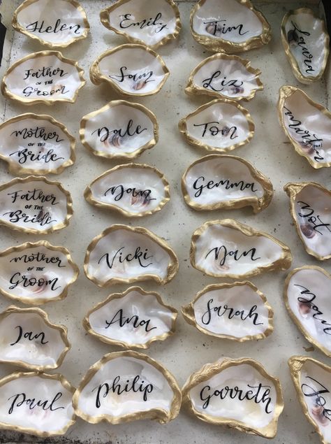 Oyster Place Setting, Shell Party Decorations, Beach Dinner Party Table, Wedding Shell Decor, Oysters At Wedding, Oyster Party Decorations, Beach Rehearsal Dinner Decorations, Elegant Beach Bridal Shower Ideas, Oyster Shell Place Setting