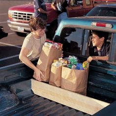 11 Pickup Truck Bed Hacks | The Family Handyman Truck Hacks, Bed Organization, Truck Bed Drawers, Truck Bed Lights, Diy Truck Bedding, Truck Bed Organization, Bed Hacks, Truck Organization, Best Pickup Truck