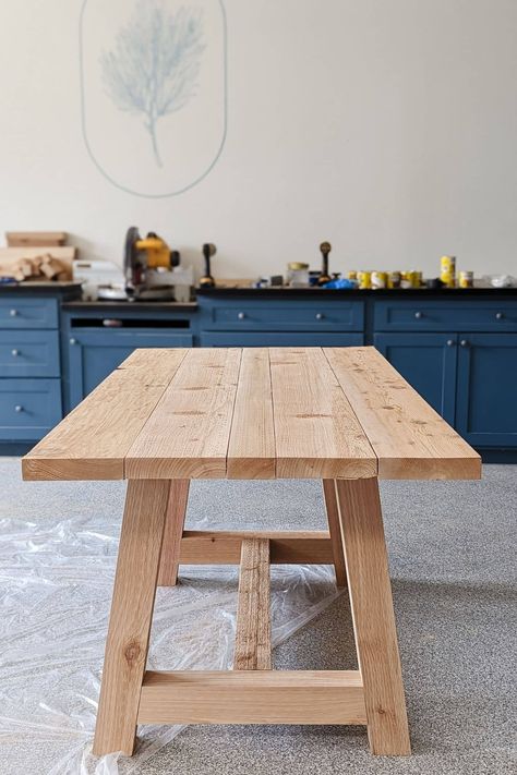 Looking for a chunky dining table that doesn't cost a fortune? Build one! We'll show you how to build this beautiful DIY table. It only requires a few steps and can be built in a day! Wooden Table Diy Dining, Home Made Dining Table, How To Build Table, Outdoor Dining Table Plans, Shanty 2 Chic Dining Table, Light Stained Dining Room Table, Exterior Table Design, Dining Table Plans Diy, Diy Dining Table And Bench