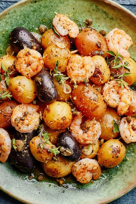 This short ingredient list features a handful of flavor powerhouses—namely garlic, oregano, capers, and lemon, which as a team can transform even the blandest proteins into a delightful meal. Here they dress quickly seared shrimp and boiled tiny potatoes to form an incredibly quick, weeknight-friendly meal. Look for peewee potatoes, which are 1½" in diameter or less and usually sold by the pound in a netted bag in the produce section. Tiny Potatoes, Seared Shrimp, Shrimp Zucchini, Tiny Potato, Mini Potatoes, Lemon Garlic Shrimp, Potato Dinner, Potato Recipe, Fresh Oregano