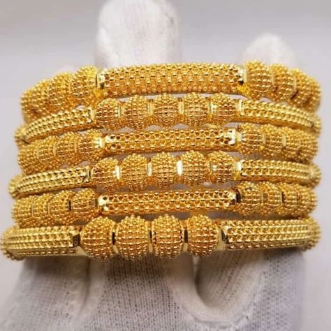 24k gold plated fancy casting bangle's sets New design collection artificial jewelry . Wholesaler of Unique Artificial Jewelry. . 24 karat gold plated fancy handmade artificial jewelry house 🏠 . Long lasting color Gold plated necklace and earrings with beautiful gift pack 24 karat gold polish Material: Gold Plated Attractive design Use with caution, avoid chemicals etc. Bridal love to use these styles. High quality polish that makes its beauty appealing. No one can judge like gold Created a ... Gold Bangles For Women, Artificial Jewelry, 24 Karat Gold, Gold Aesthetic, Gold Bangles Design, Gift Pack, Bangle Designs, Bangle Set, Gold Polish