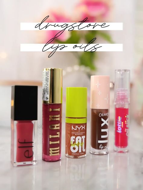 Let's compare and swatch the top 5 drugstore lip oils. With so many to choose from, read this review to see the difference between the most popular choices. | Slashed Beauty Drugstore Lips, Lip Oils, Pomegranate Oil, Best Drugstore Makeup, Calendula Oil, Budget Beauty, Nyx Makeup, Lip Swatches, Apricot Oil