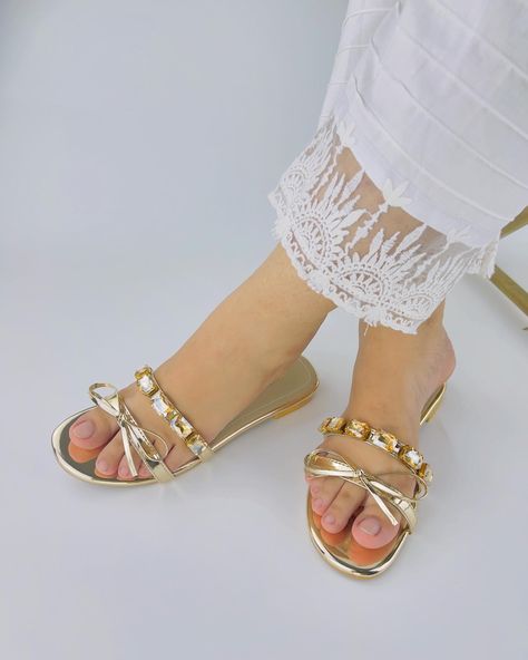 ✨ Step Into Luxury with Spunkz! ✨ Introducing our Myra Embellished Mirrored Leather Flat Slides—the ultimate in elegance and shine! 🌟 Featuring a stunning rhinestone crystal diamond decor with a knot strap, these golden slippers are perfect for a luxurious look. 🎉 Up to 60% Off + Free Delivery across Pakistan! 🎉 Don’t miss out on the best women’s flat sandals that blend style and sophistication. Elevate your wardrobe with Spunkz today! #Spunkz #LuxuryFootwear #FlatSlides #PakistaniFashion... Golden Sandals, Diamond Decor, Diamond Decorations, Crystal Diamond, Diamond Crystal, Pakistani Fashion, Leather Flats, Luxury Shoes, Flat Sandals