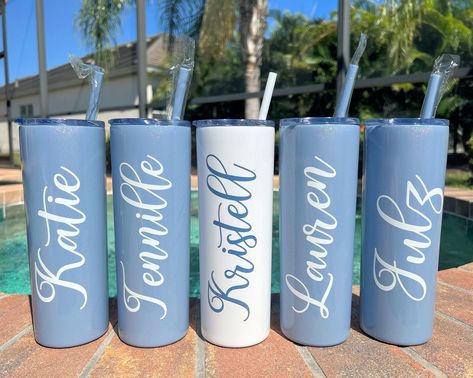 You will love this beautiful and high quality glitter dusty blue skinny tumbler with straw. This personalized tumbler makes a great birthday, bridesmaid gift or bachelorette party favor! Slate blue print color is a great compliment to the tumblers on glitter white, white or pearl waves tumblers! Many font colors are directly printed on the tumblers. High quality outdoor sign vinyl is applied to customize the names for metallic, satin and holographic colors. Please see color chart for colors and Tumblers For Wedding Party, Dusty Blue Wedding Country, Dusty Blue Bridesmaid Boxes, Wedding Party Cups, Bridesmaid Proposal Dusty Blue, Dusty Blue Bridesmaid Proposal, Slate Blue Bridesmaids, Dusty Blue Bridesmaid Proposal Boxes, Wedding Party Tumblers