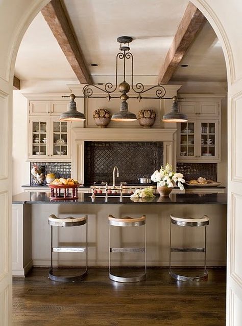 Beams across the ceiling, arched entry, graceful light fixture, granite counters, juxtaposed with industrial looking stainless stools. Sweet.  southernhospitalityblog.com Country Kitchen Designs, Kitchen Time, French Country Kitchen, Benjamin Moore, Beautiful Kitchens, Rustic Kitchen, Kitchen Backsplash, Country Kitchen, Kitchen Lighting