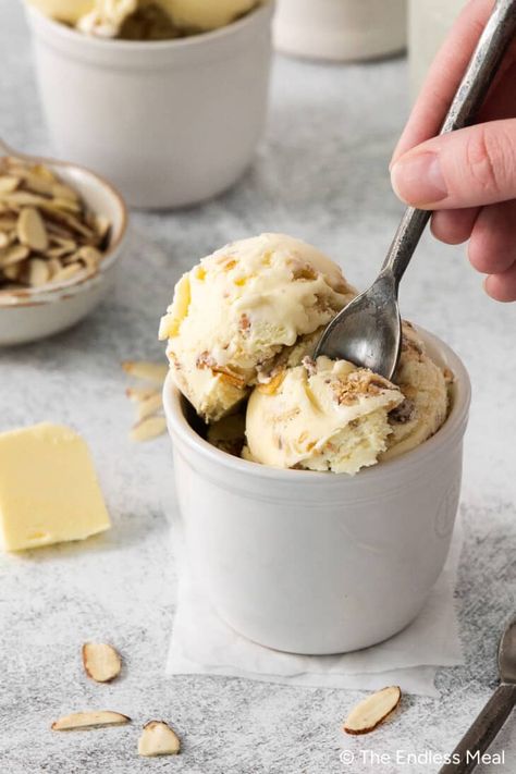 This butter almond ice cream recipe is rich, buttery, creamy, and sweet. It's made from a simple egg yolk custard for creaminess and finished with the addition of butter-sauteed almond slices for a little crunch. It's luscious, versatile, and easy to whip up in the comfort of your home! #theendlessmeal #icecream #almonds #almondicecream #dessert #summer Almond Ice Cream Recipe, Egg Yolk Custard, Unique Ice Cream Flavors, Beer Ice Cream, Homemade Almond Butter, Strawberry Ice Cream Recipe, Almond Ice Cream, Dessert Summer, Almond Crunch