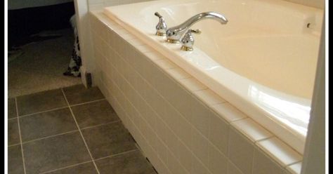 We wanted to give our outdated bathtub a fresh new look without breaking the bank. After giving it some thought, we decided to leave the existing tile in place,… Garden Tub Update, Update Garden Tub Master Bath, Shiplap Around Tub, Update 90s House, Tub Surround Ideas Cheap, Garden Tub Makeover, Garden Tub Decor Master Bath, Garden Tub Remodel, Garden Tub Decor