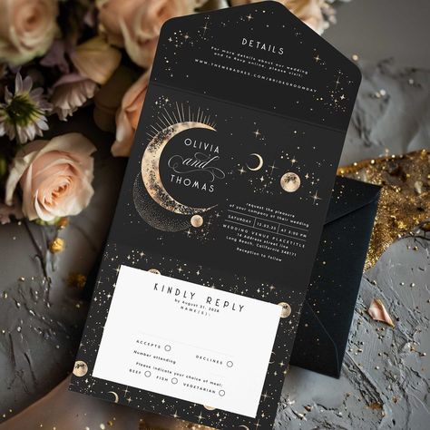 This romantic black and gold all-in-one wedding invitation offers a breathtaking preview of the beauty that your special day will unfold. It combines the wedding invitation itself with a detachable RSVP card for guests to return, and a section detailing your wedding specifics, including your website. This elegant and compact design effortlessly blends simplicity with a touch of luxurious sophistication. Adorned with celestial motifs such as the crescent moon, radiant sun halo, twinkling stars, w Black Navy Gold Wedding, Black And Gold Celestial Wedding, Starry Wedding Invitations, Coldplay Wedding Theme, Twlight Eclipse Wedding Theme, Wedding Moon Theme, Astrology Themed Wedding, Whimsical Celestial Wedding, Universe Wedding Theme