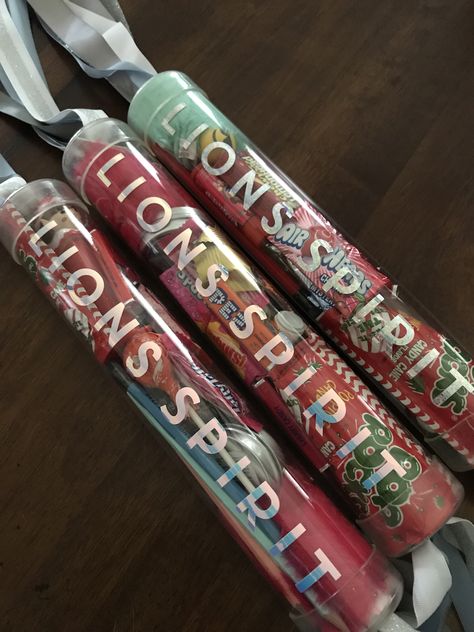 Custom cheer spirit sticks filled w goodies or candy Spirit Stick Decorating Ideas, Cheerleading Spirit Stick Ideas, Cheer Spirit Sticks Diy, Candy Spirit Sticks Cheer, Spirit Stick Ideas Diy, Cheer Sticks Spirit Diy, Spirit Sticks Cheerleading Diy, Mini Cheer Spirit Sticks, Cheer Spirit Sticks