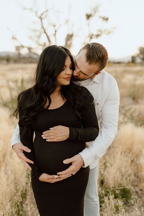 Maternity photoshoot outfit idea Maternity Session Black Dress, Maternity Photography Mens Outfit, Pregnant Fall Wedding Guest Outfit, Black Long Sleeve Maternity Dress, Simple Maternity Pictures Outdoor, Plaid Maternity Photos, Black Sweater Dress Maternity Photos, Maternity Photo Shoot With Props, Maternity Pics Outside