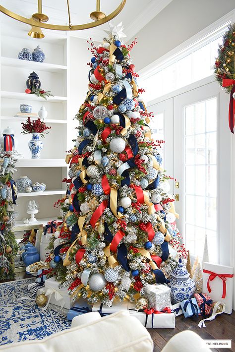 Beautiful flocked Christmas tree with greenery picks, berry picks and red, blue and metallic decorations. Blue And Red Christmas Tree, Blue And Red Christmas, Christmas Tree Inspo, Chinoiserie Christmas, Look Rich, Blue Christmas Decor, Red Christmas Decor, Flocked Christmas Trees Decorated, Blue Christmas Tree