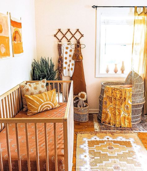 Sunny Themed Nursery, 70s Baby Nursery, 70s Nursery Theme, Boho Cribs, Nursery With Color, Boho Sunshine Nursery, Nursery Ideas Neutral Boho, Cute Nursery Themes, Boho Gender Neutral Nursery