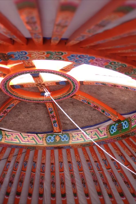 Crown of Mongolian Yurt painted in orange pattern. Yurt Wedding, Round Homes, Yurt Interior, Venue Party, Mongolian Yurt, Unusual Wedding Venues, Earth Bag Homes, Yorkshire Wedding, Earth Bag