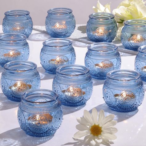 PRICES MAY VARY. 🥂Votive Candle Holders Bulk: Included in your package are 48pcs glass votive candle holders. These holders measure cute size of 2ʺD x 2ʺH. They serve as excellent companions for any dining table, accommodating regular votive candles, tea light candles, flameless LED tea candles, thereby fostering a warm and inviting ambiance that elevates the dining experience. 🌻Vintage Candle Holder Decor: This blend seamlessly melds retro and minimalist fashion. Employing embossing technolog Candle Centerpieces For Home, Blue Bridal Shower Decorations, Blue Votive Candle Holders, Votive Candle Holders Wedding, Blue Sweet 16, Reception Table Centerpieces, Blue Candle Holders, Blue Centerpieces, Blue Candle